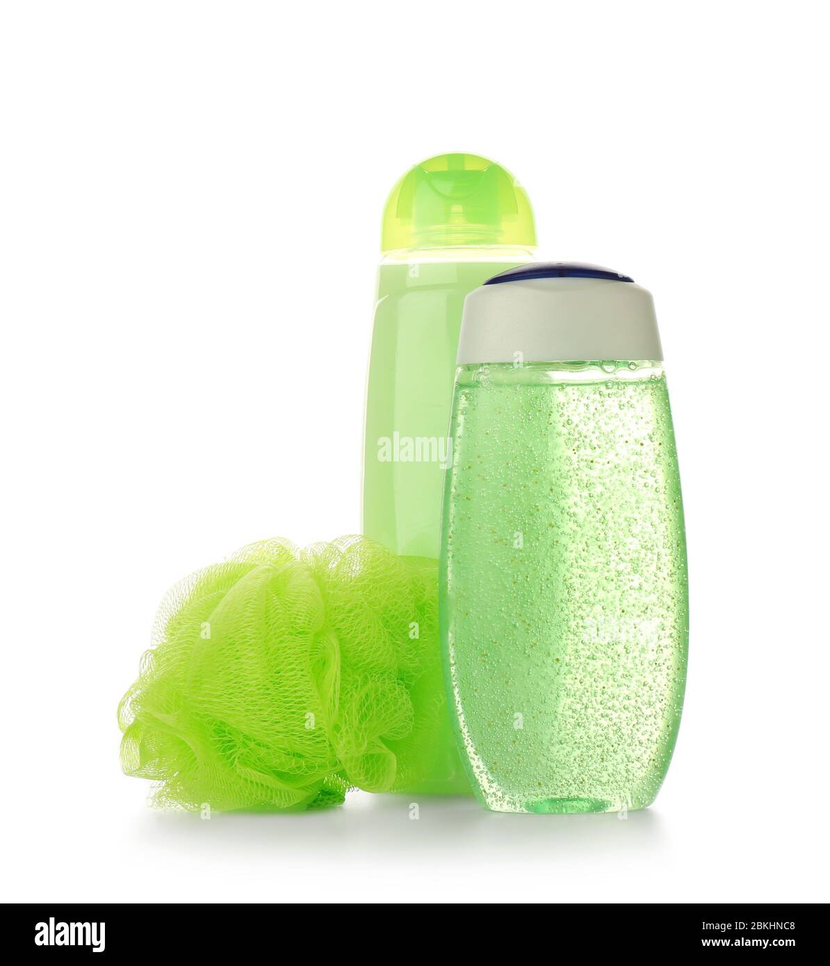 Shower gels and loofah on white background Stock Photo Alamy