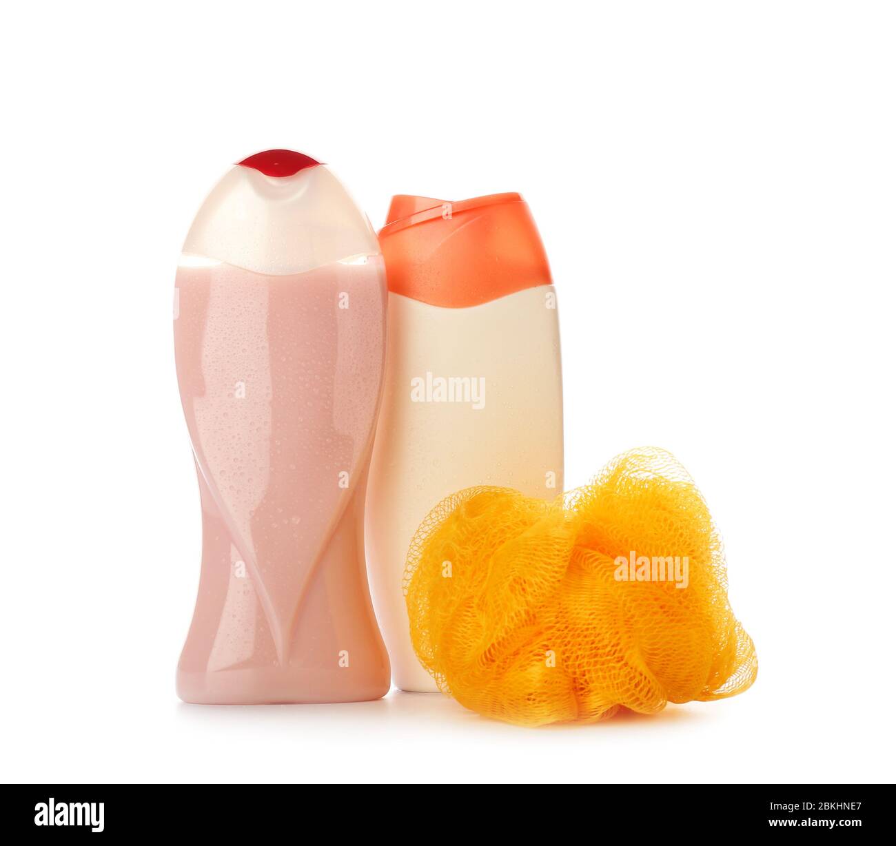 Shower gels and loofah on white background Stock Photo Alamy