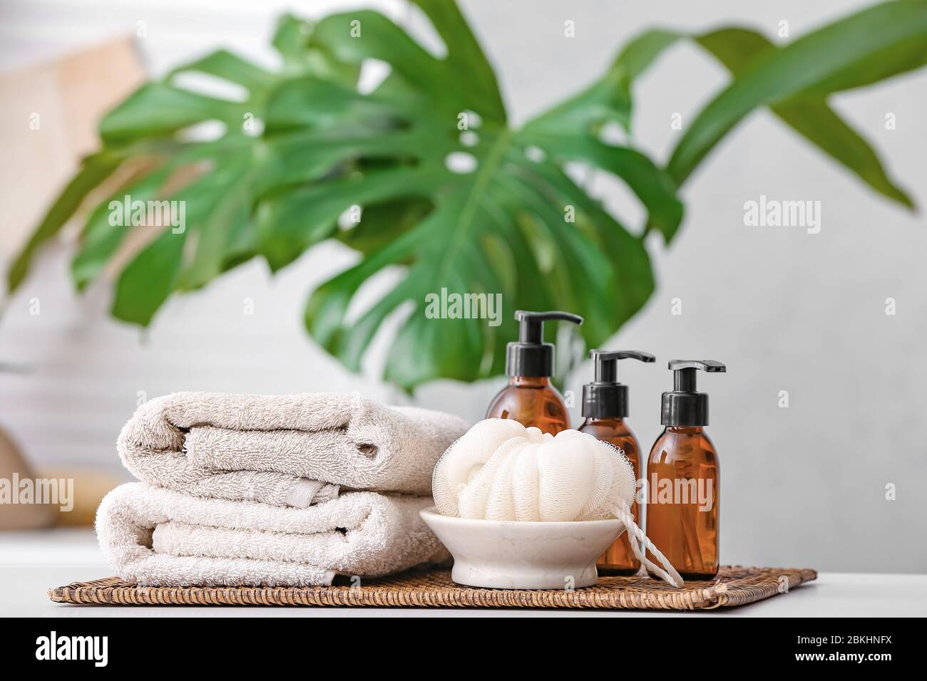 Shower gels, towels and loofah in bathroom Stock Photo Alamy