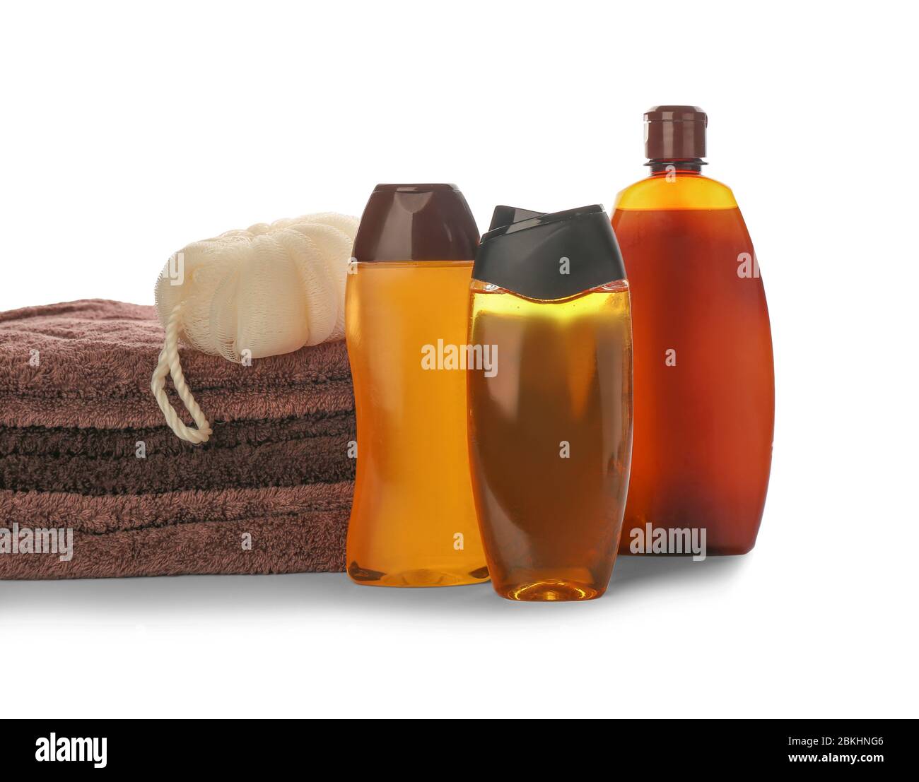 Shower gels, towel and loofah on white background Stock Photo Alamy
