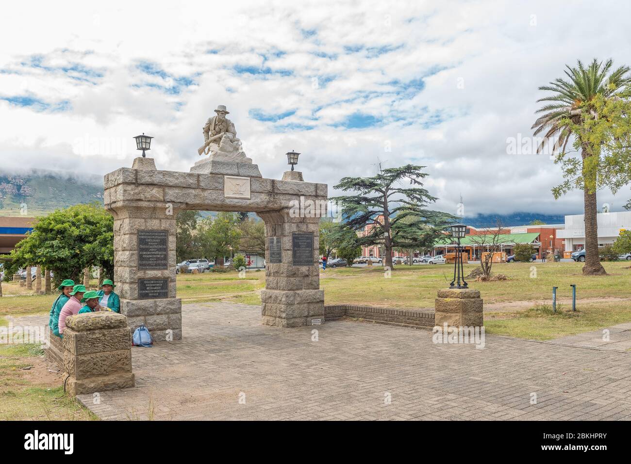HARRISMITH, SOUTH AFRICA - MARCH 16, 2020:  A street scene, with a monument commemorating locals who died in the Boer War, in Harrismith. People are v Stock Photo