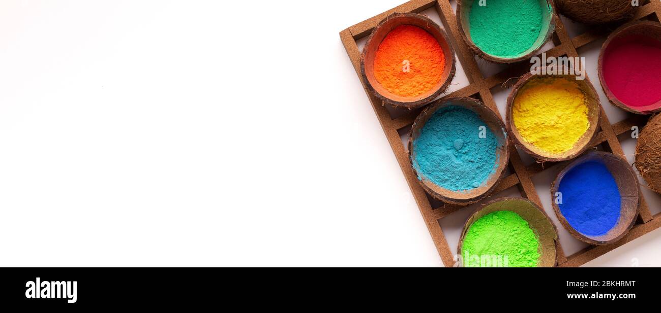 Bright paint in coconut shell for Holi Stock Photo