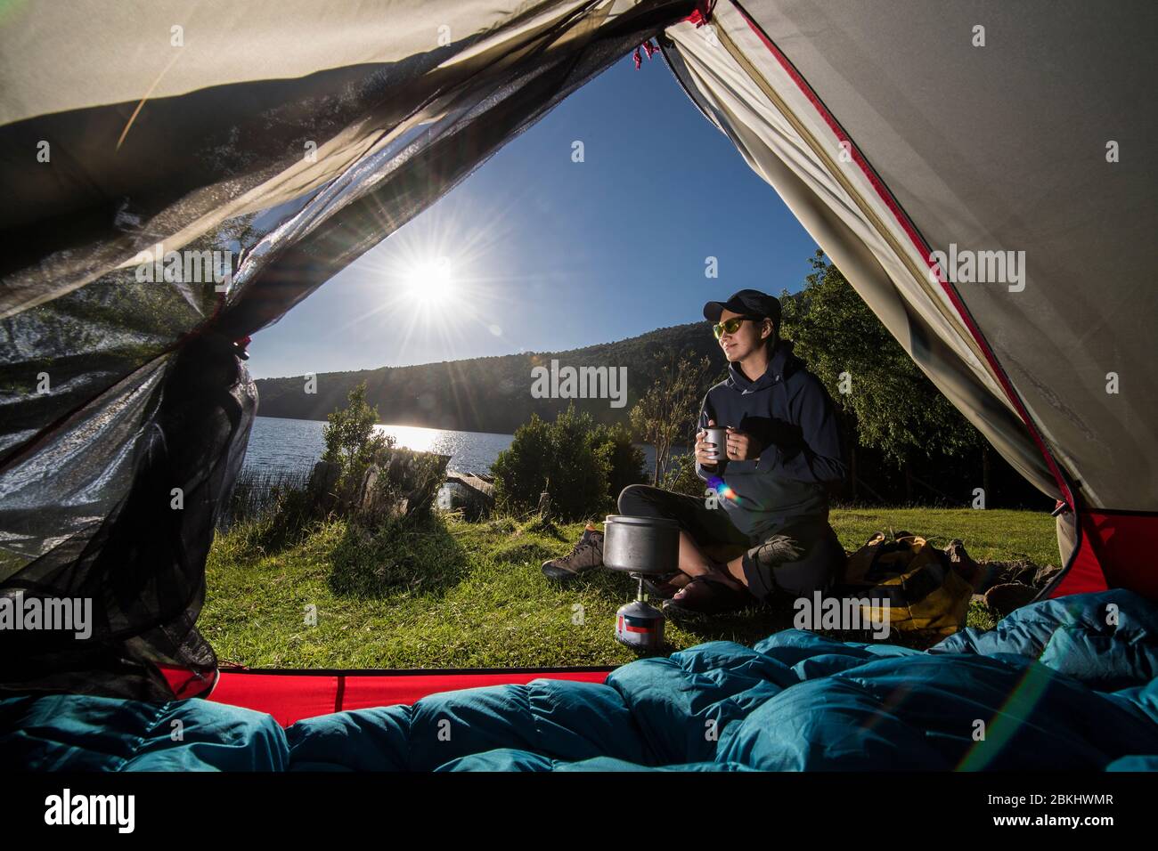 One woman camping sun tent hi-res stock photography and images - Alamy