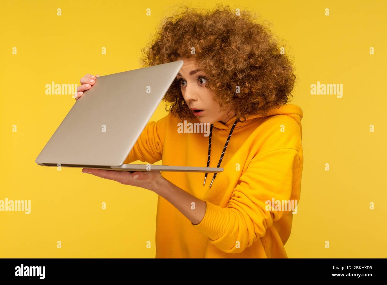 Confused student looking laptop screen hi-res stock photography and ...