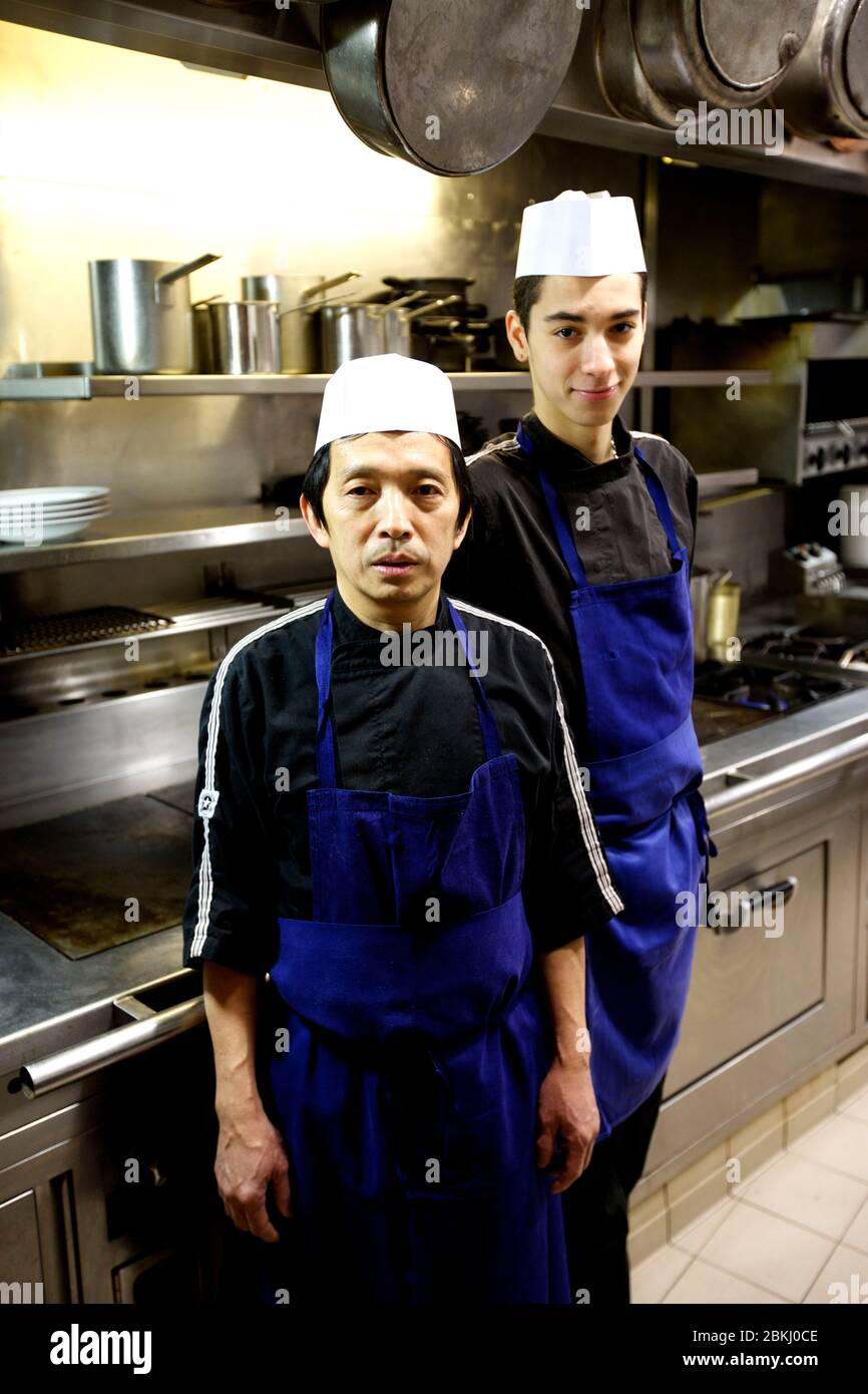 France, Paris, Chez Eux bistro, apprentices and clerks Faycal and Lam Stock Photo