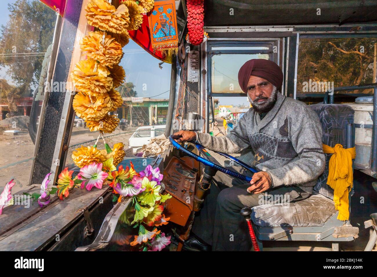 India, Punjab State, Atari, Sikh driver, bus bound for Wagah border post, Indo-Pakistan border Stock Photo