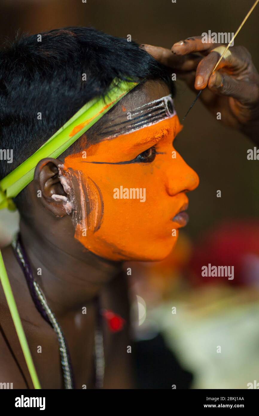 India, Kerala State, proximity to Kannur, Vattappoyil village, Theyyam character makeup, Hindu cultural and religious rite Stock Photo