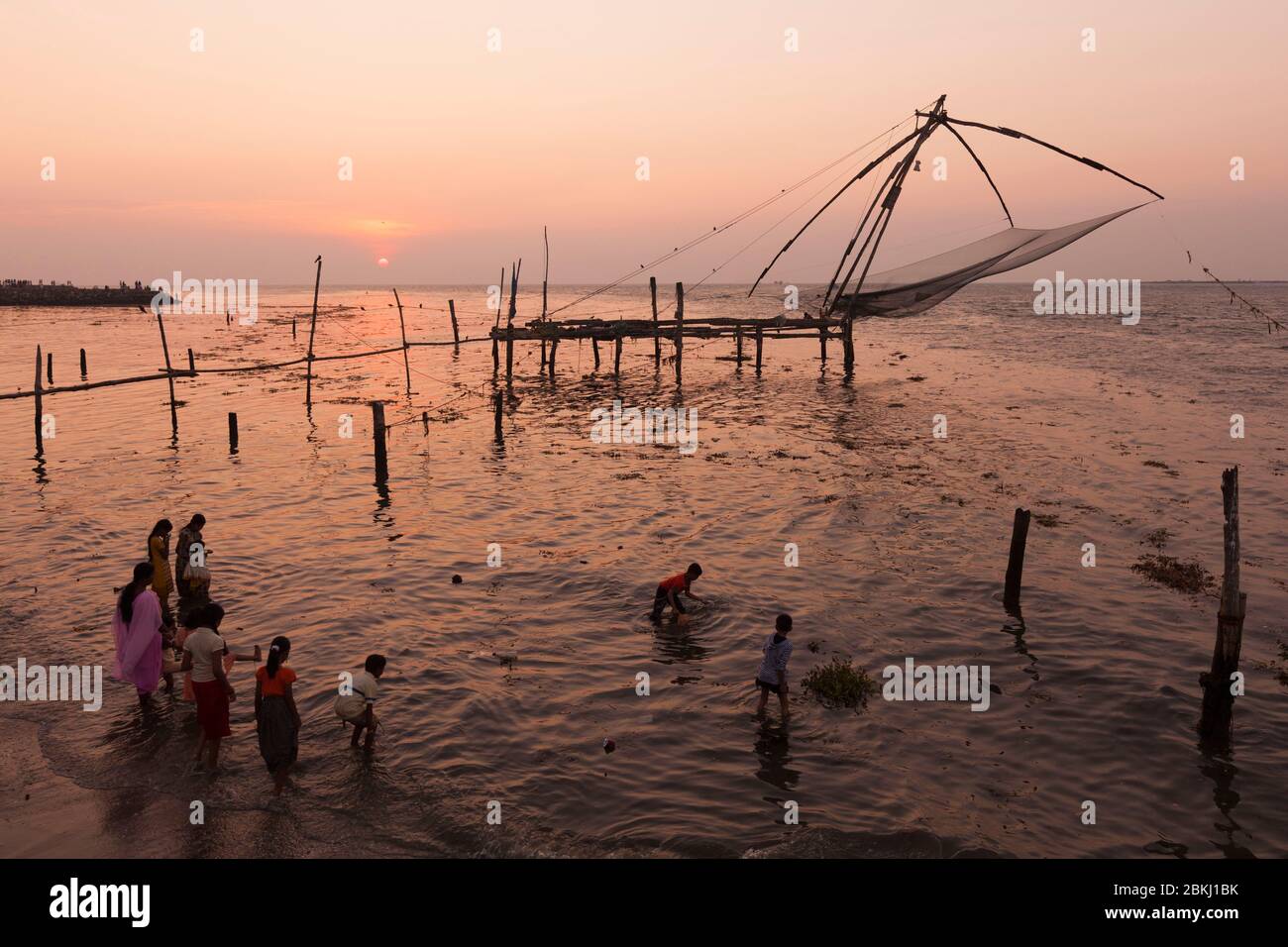 India, Kerala State, Kochi, district of Fort Cochin, shore operated lift nets at sunset, also
