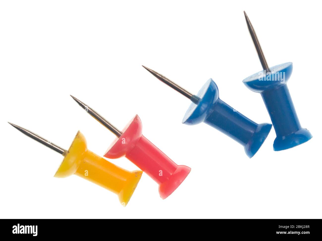 Push pins isolated on white background Stock Photo - Alamy