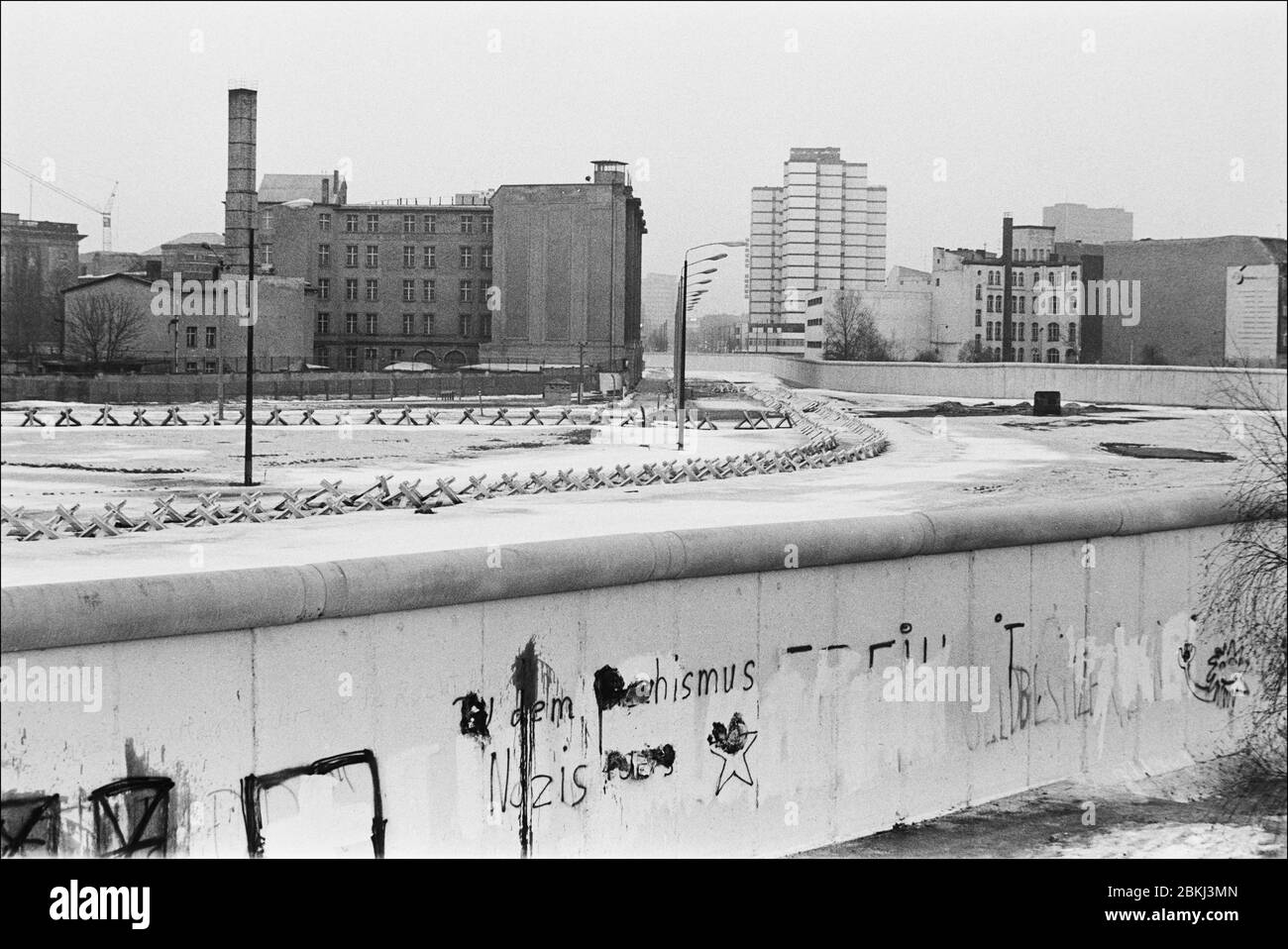 The Berlin wall looking twards East Berlin accross no mans land 1979