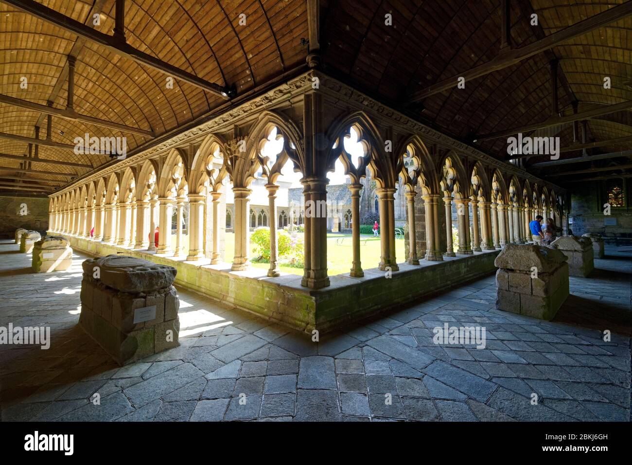 France, Cotes d'Armor, Treguier, Saint-Tugdual cathedral, the cloister in flamboyant gothic style from 1461 and recumbent statue Stock Photo