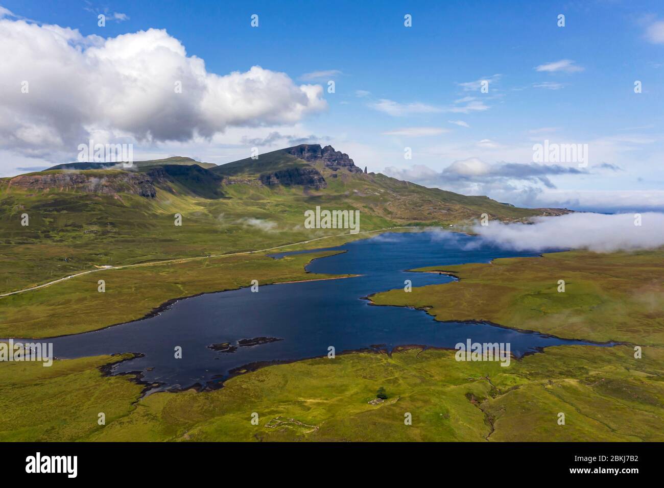 United Kingdom, Scotland, Highlands, Hebrides, Isle of Skye, Loch Leathan and the Old Man of Storr in the background Stock Photo