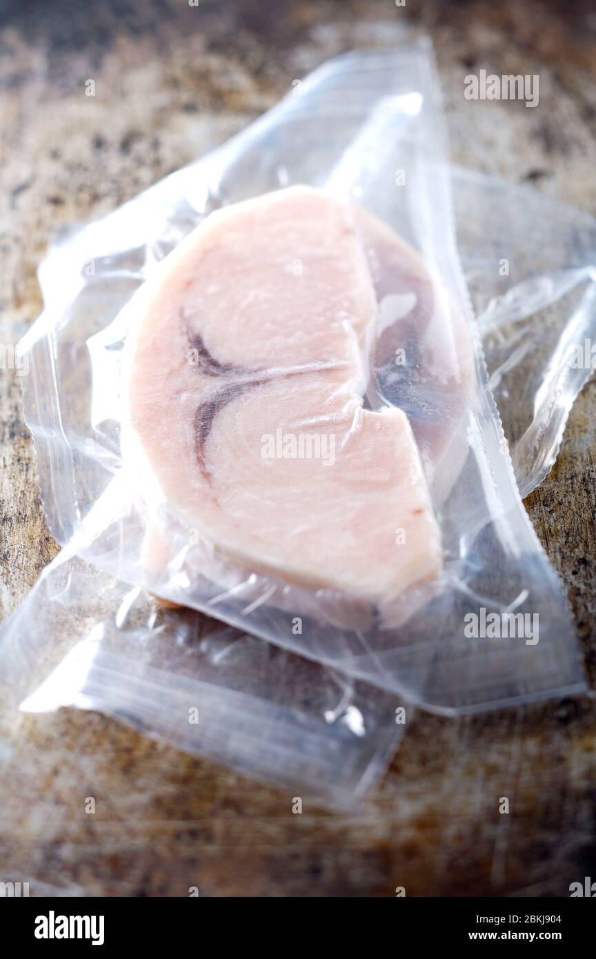 Portion of frozen swordfish Stock Photo Alamy