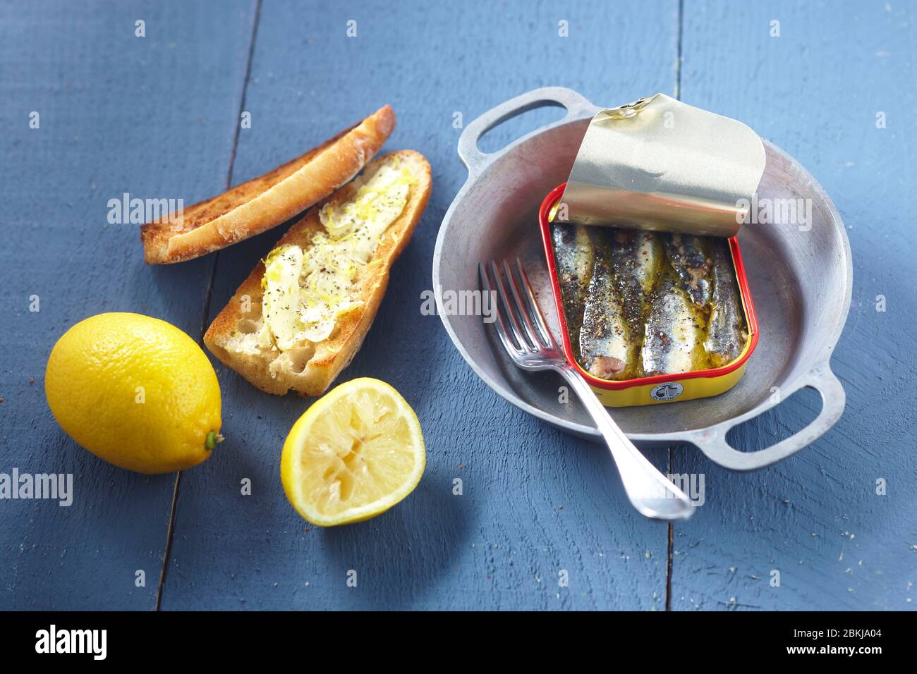Sardines in hot box Stock Photo Alamy