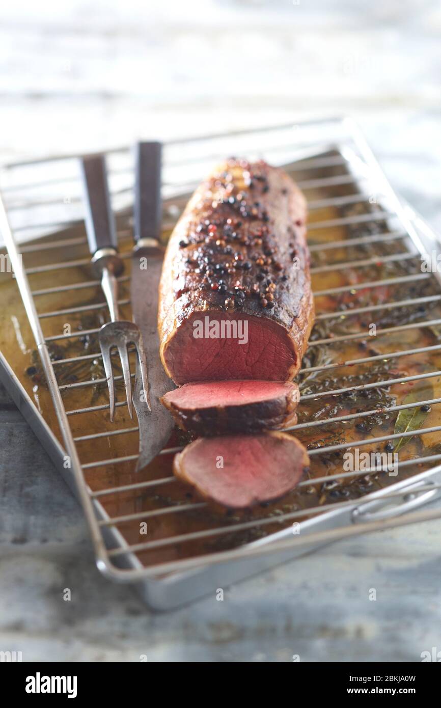 Roast beef in pepper crust Stock Photo - Alamy