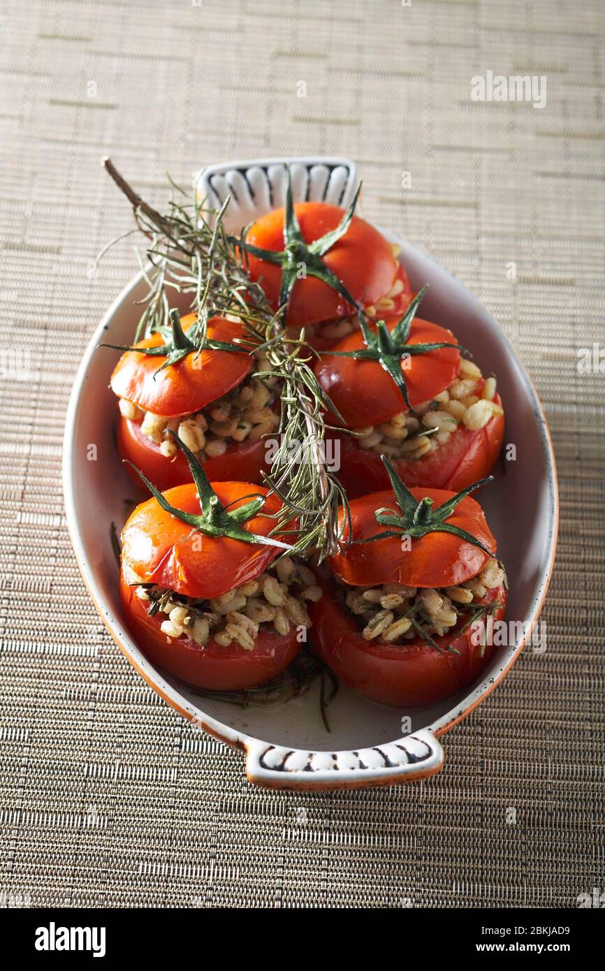 Rosemary wheat stuffed tomatoes Stock Photo