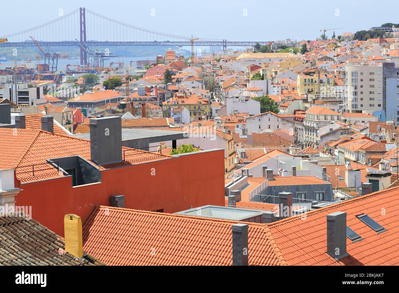Portugal, Lisbon, view from Bairro Alto on the Lapa district with the Tagus river and the April 25 bridge in the background Stock Photo