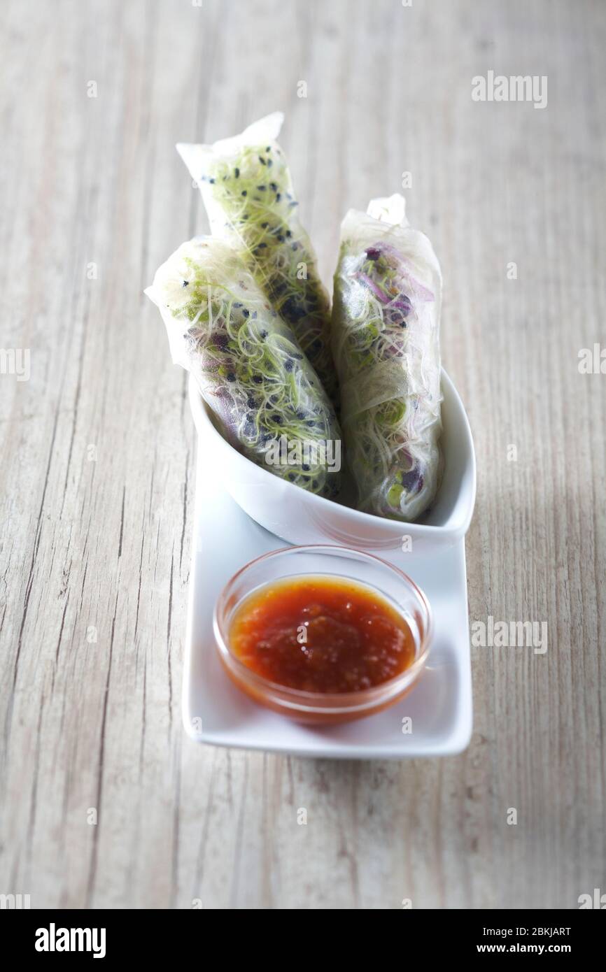 Organic, spring roll with carrot sprouts Stock Photo