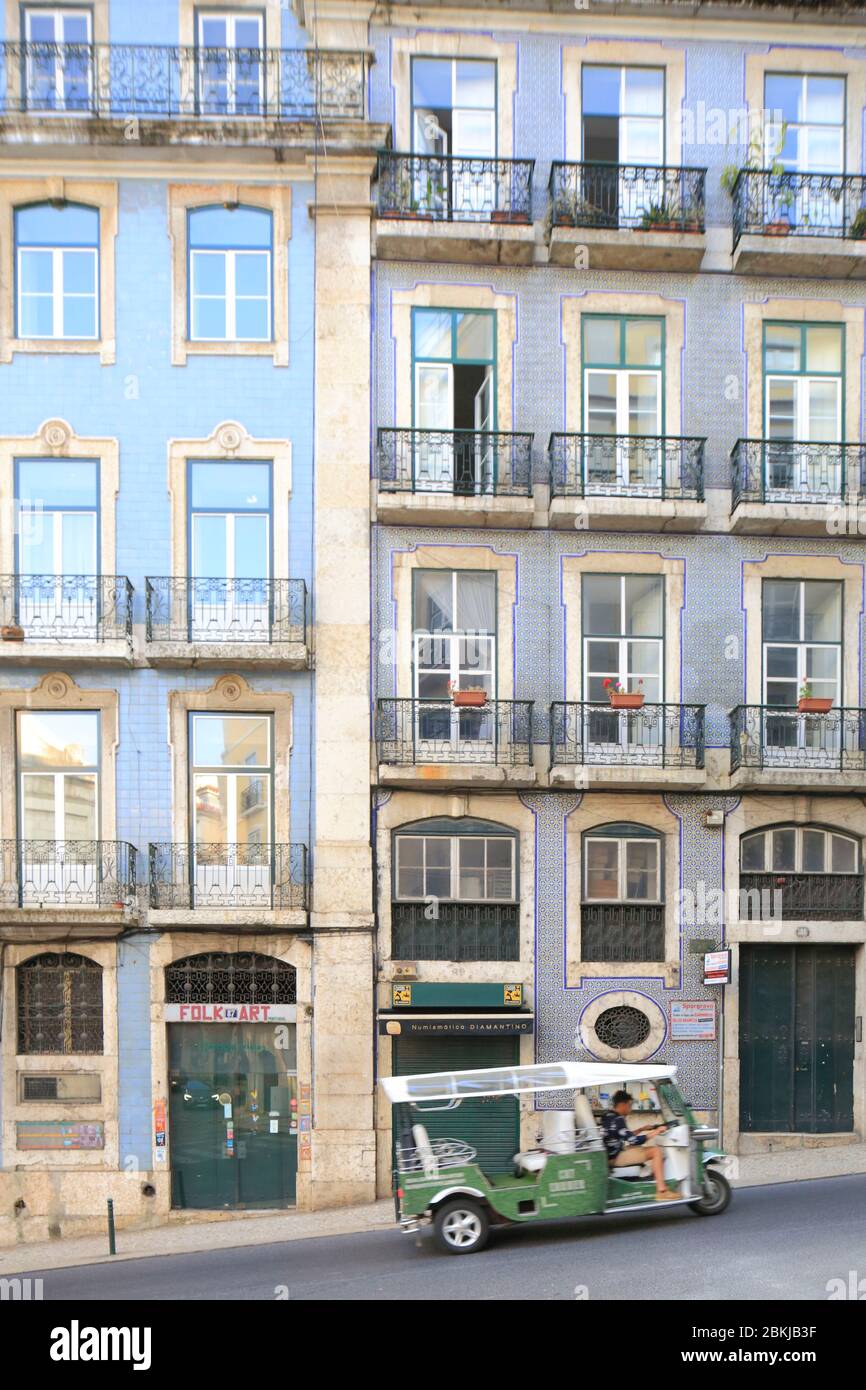 Portugal, Lisbon, Baixa district with a tourist tuk-tuk Stock Photo