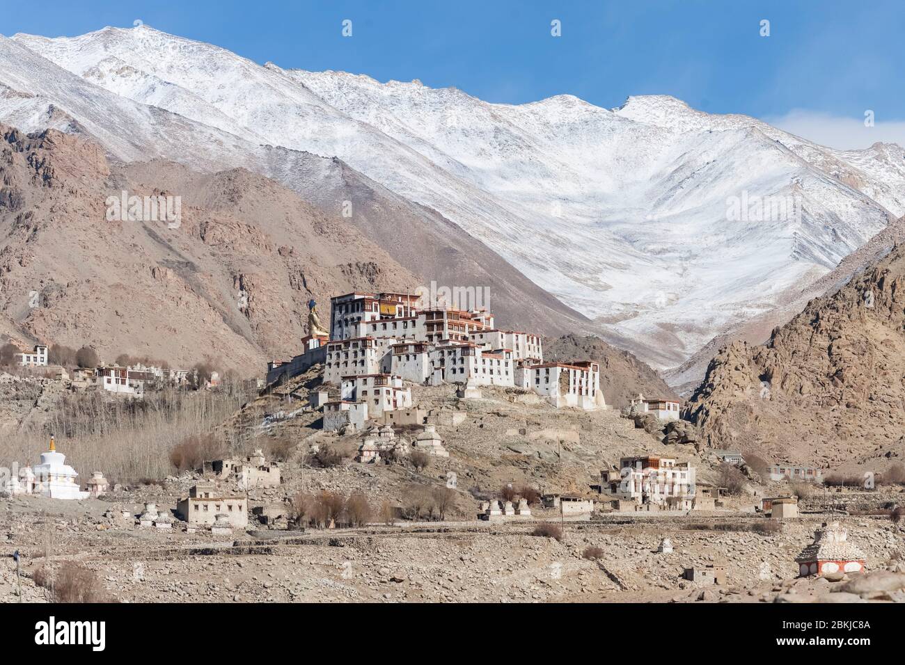 India, Jammu and Kashmir, Ladakh, Likir Gompa, general view on monastery and snow-capped mountains in the background, altitude 3500 meters Stock Photo