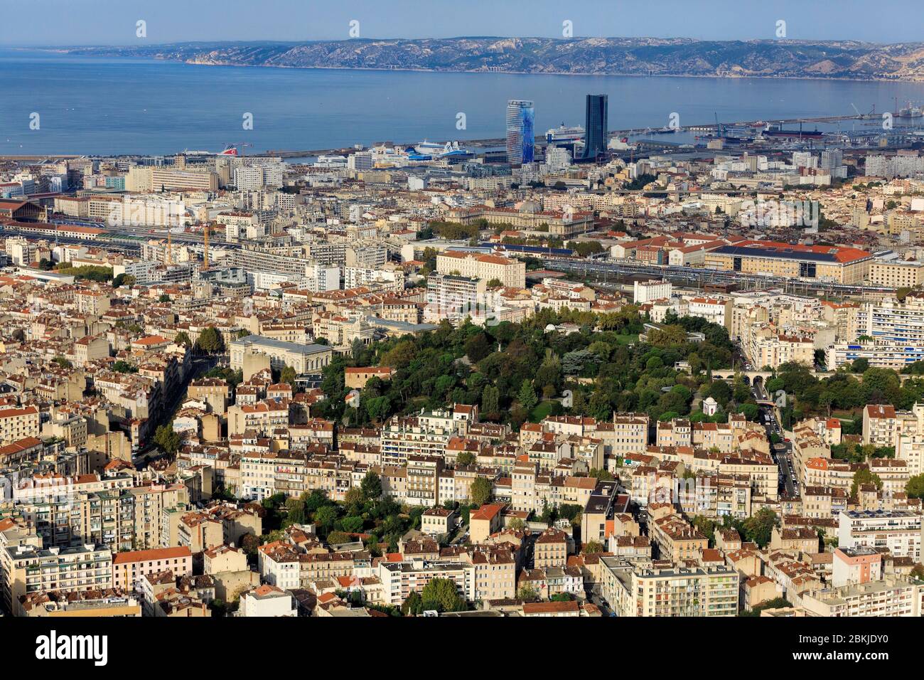 France, Bouches du Rhone, Marseille, 4th arrondissement, Longchamp district, Palais Longchamp garden, Muy barracks (19th century) and the Arenc district, the CMA CGM tower, architect Zaha Hadid and La Marseillaise tower, architect Jean Nouvel in the background (aerial view) Stock Photo