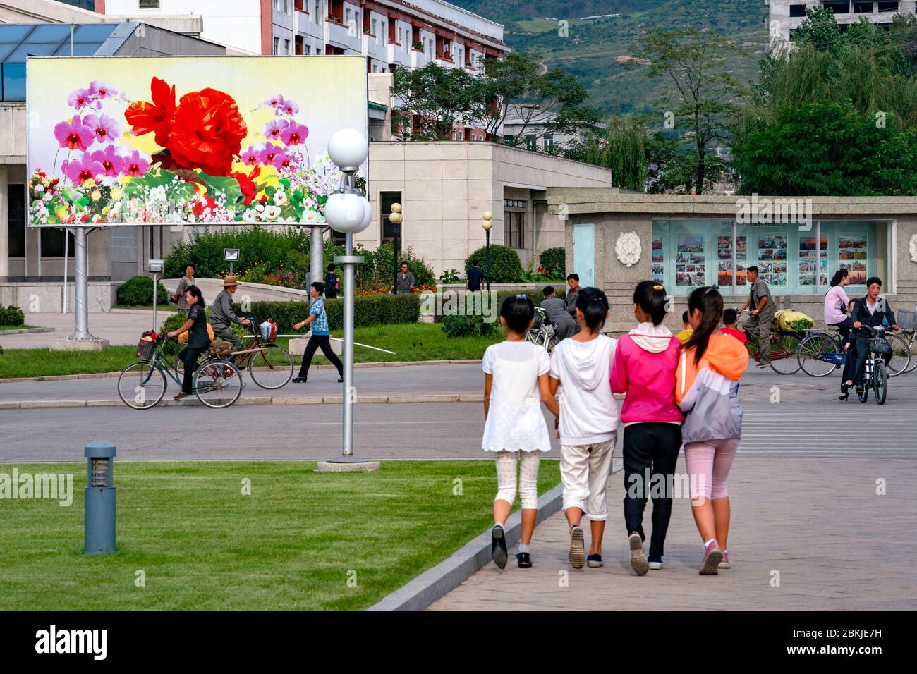 North Korea, Chongjin the second largest town in the country, Central square, painting with a red begonia and pink orchids representing Kim Jong Il and Kim Il Sung Stock Photo