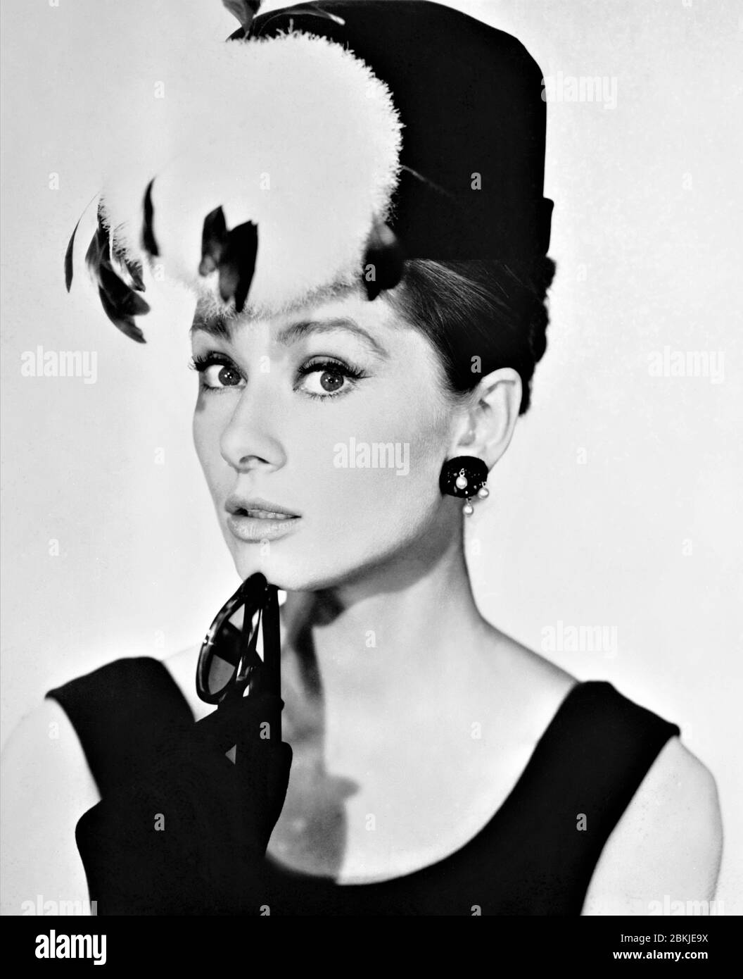 AUDREY HEPBURN as Holly Golightly Portrait by BUD FRAKER for BREAKFAST AT TIFFANY'S 1961 director BLAKE EDWARDS gown Hubert de Givenchy novel Truman Capote Jurow-Shepherd / Paramount Pictures Stock Photo