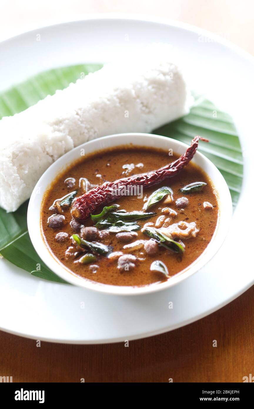 India, Kerala, Puttu steamed rice cake Stock Photo