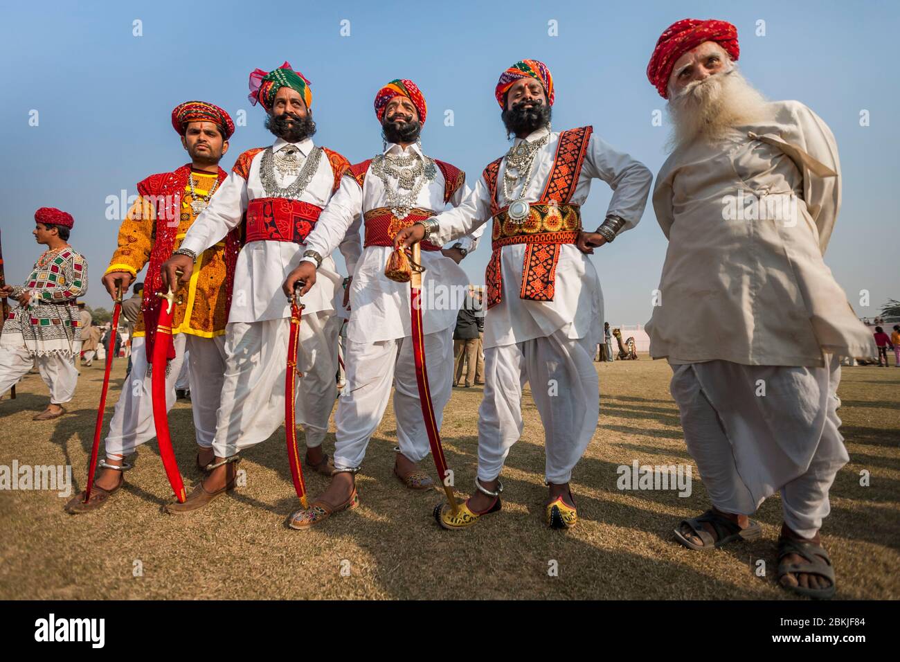 India, Rajasthan, Bikaner, Camel Festival, group of men wearing traditional clothes Stock Photo