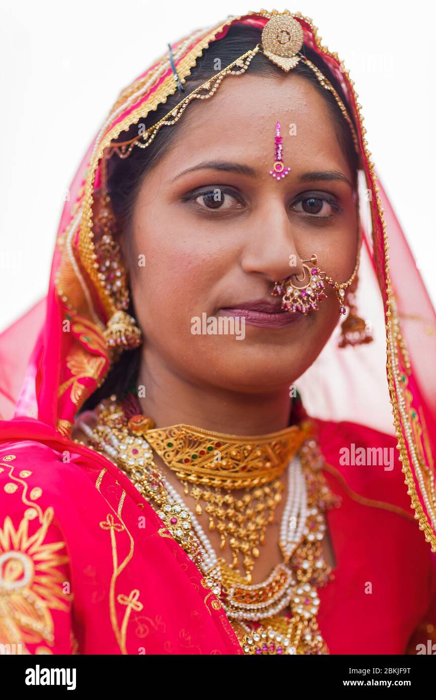 India, Rajasthan, Bikaner, Camel Festival, portrait of a woman wearing a sari and jewelry Stock Photo