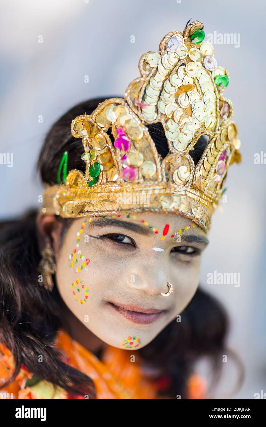 India, Rajasthan, Udaipur, portrait of a smiling girl disguised as the goddess Sita Stock Photo