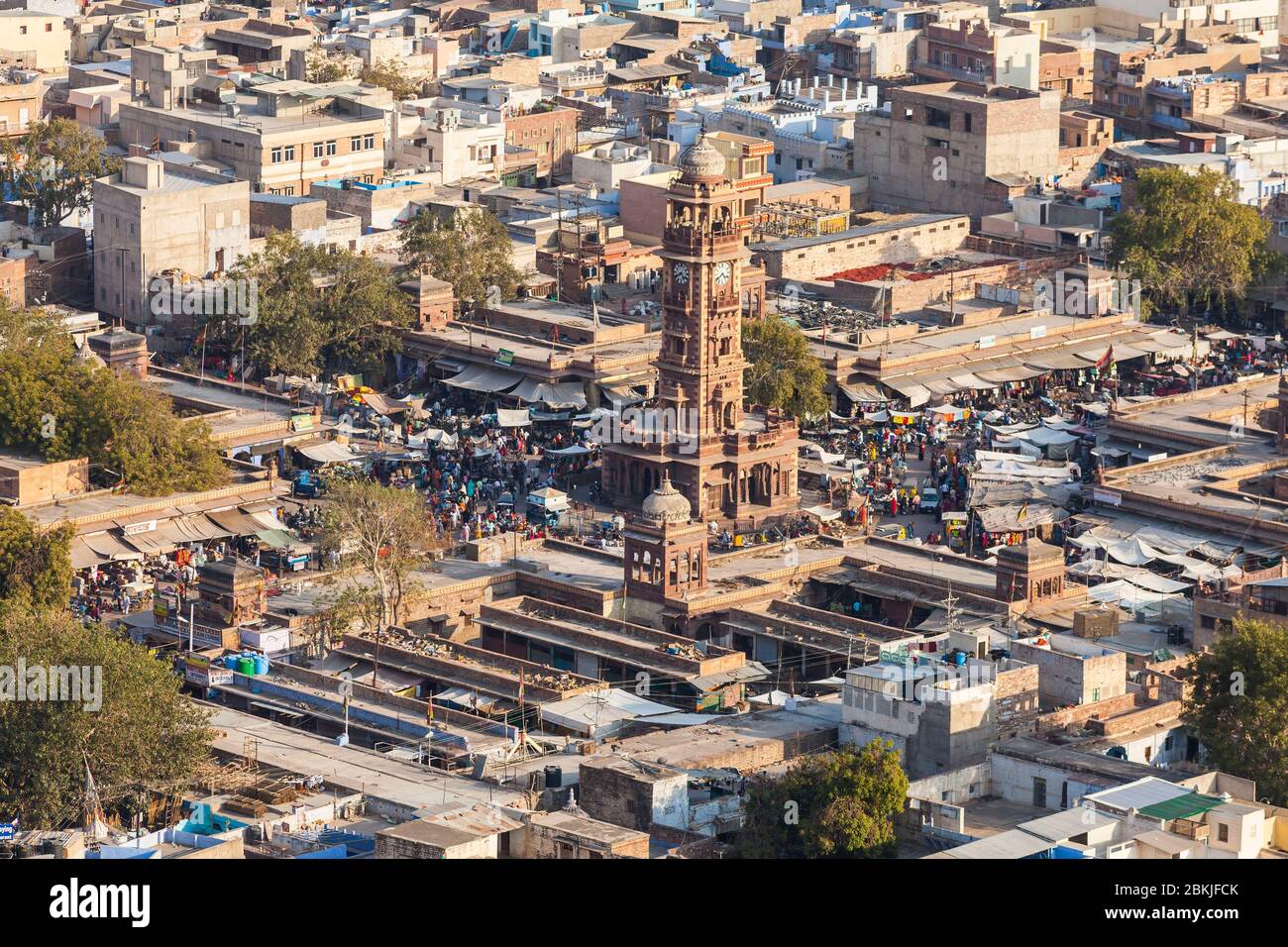 India, Rajasthan, Jodhpur, Pachetia Hill, elevated view over the blue city skyline and the Clock Tower market Stock Photo