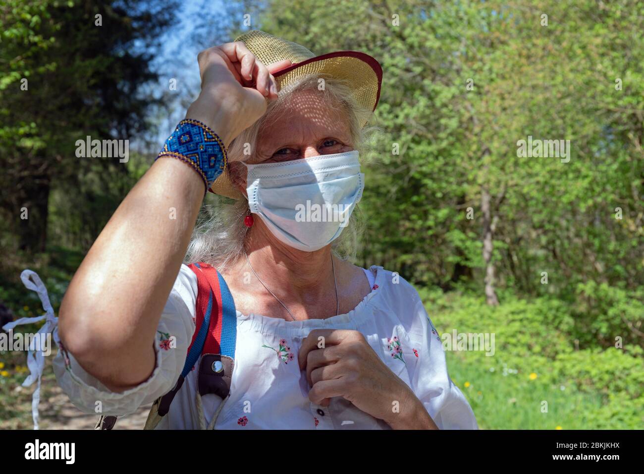 Europe, Luxembourg, Insenborn, Attractive older woman wearing a face