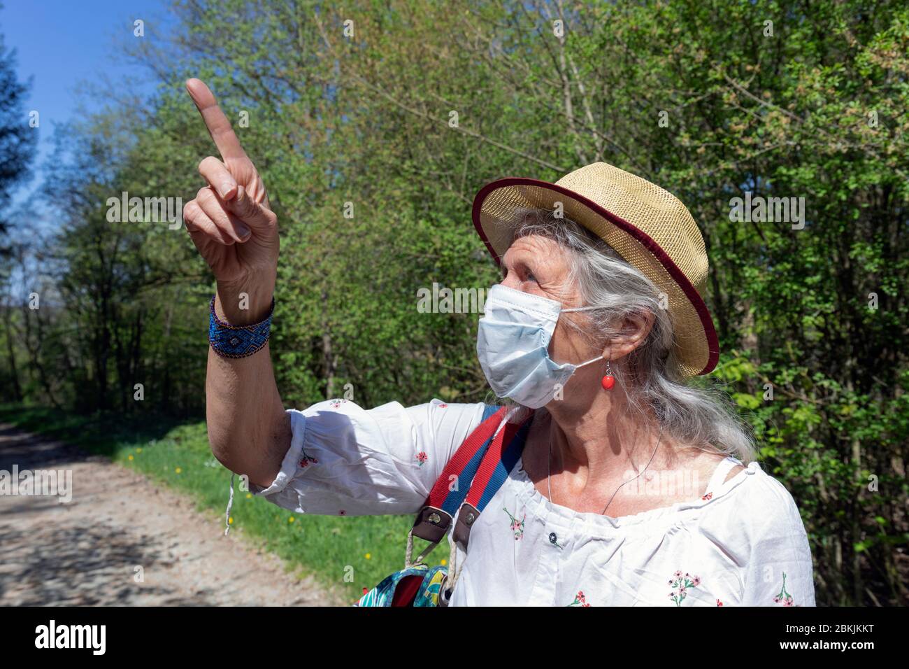 Europe, Luxembourg, Insenborn, Attractive older woman wearing a face