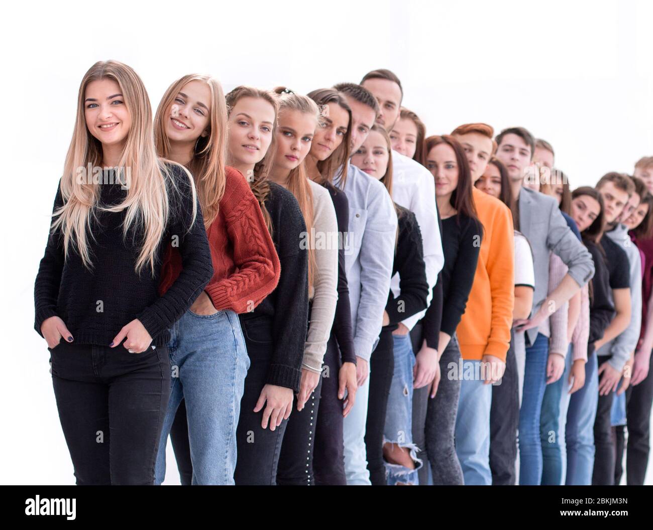 group of diverse young people standing in line Stock Photo - Alamy