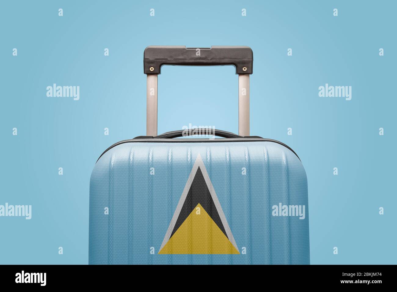 Suitcase with Saint Lucia flag design travel Caribbean America concept. Stock Photo