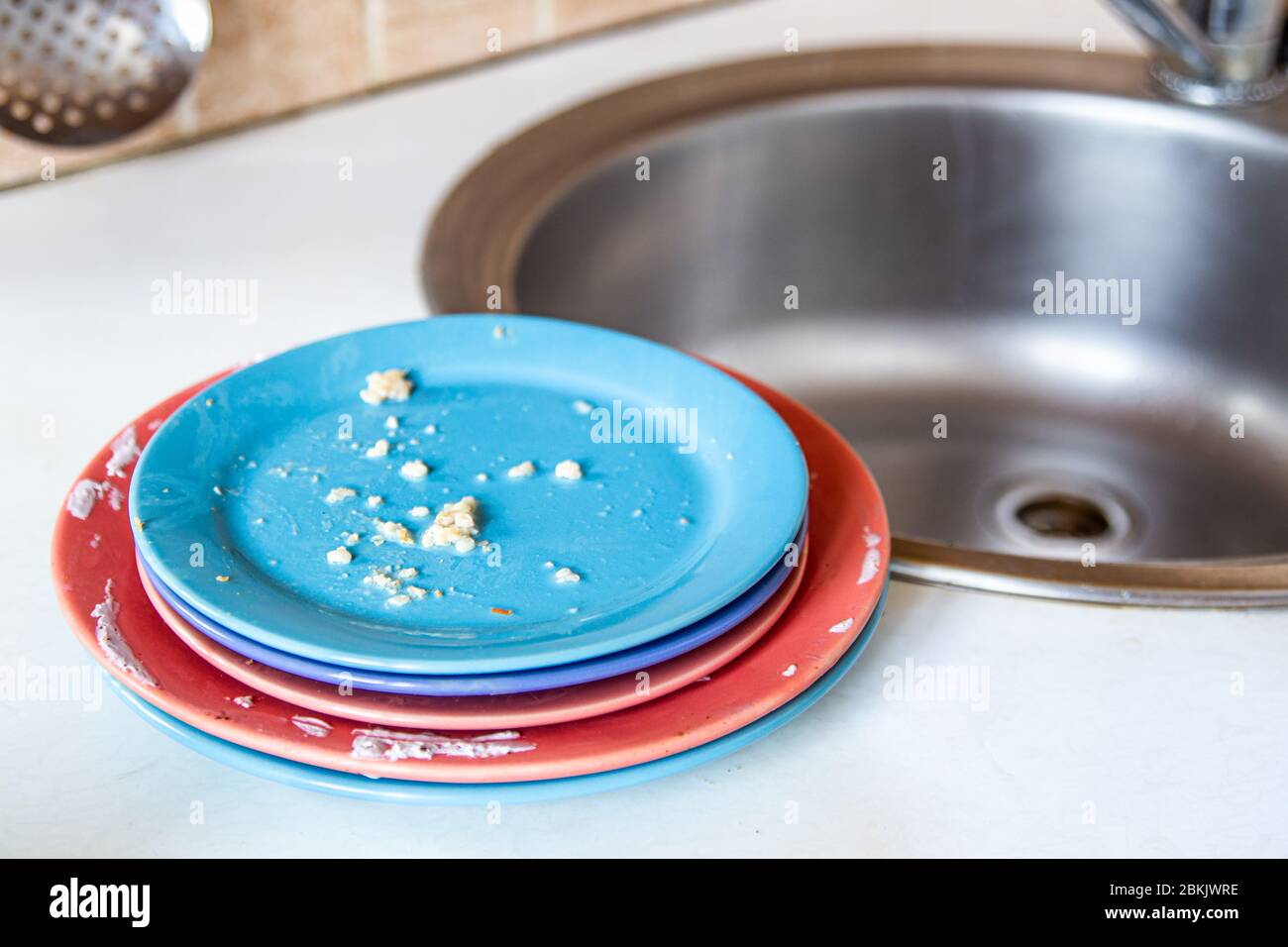 Dirty dishes near the sink Stock Photo Alamy