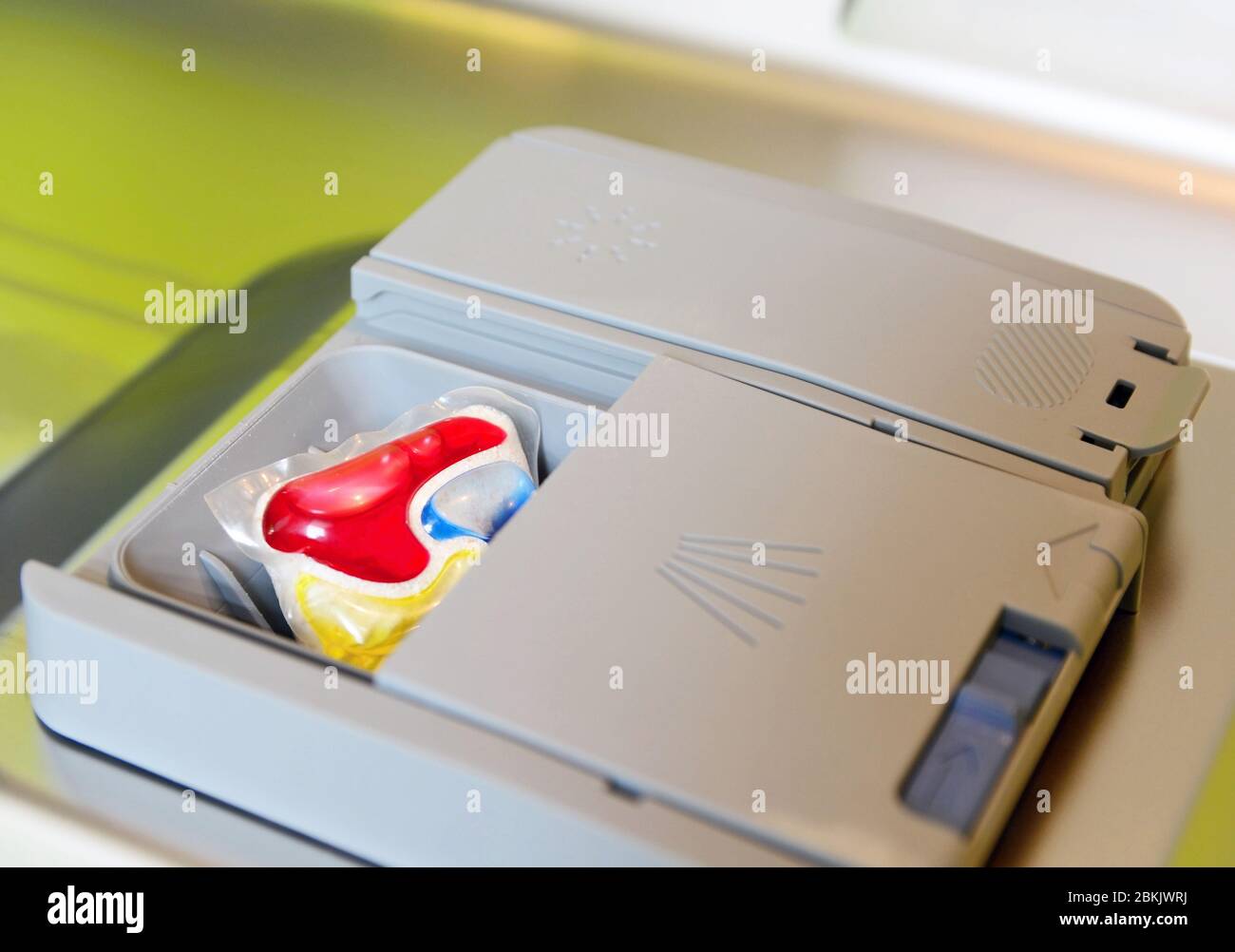 Closeup of detergent tablet in the dishwasher tray Stock Photo Alamy