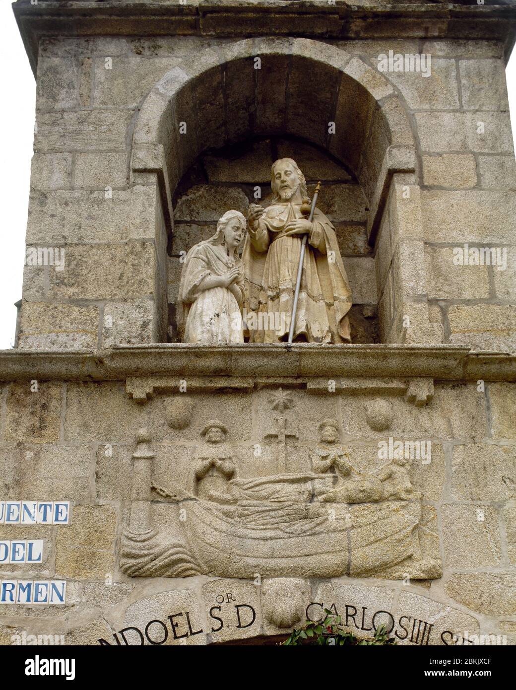Spain, Galicia, La Coruña province, Padron. Carmen Fountain. In the upper body, sculptural group depicting the baptism of Queen Lupa by the Apostle James. In the central body (at the bottom of the image), translation of James the Great by his disciples to these lands. The fountain was built by Pedro de la Barcena in 1577, and rebuilt in the 18th century. Detail. Stock Photo
