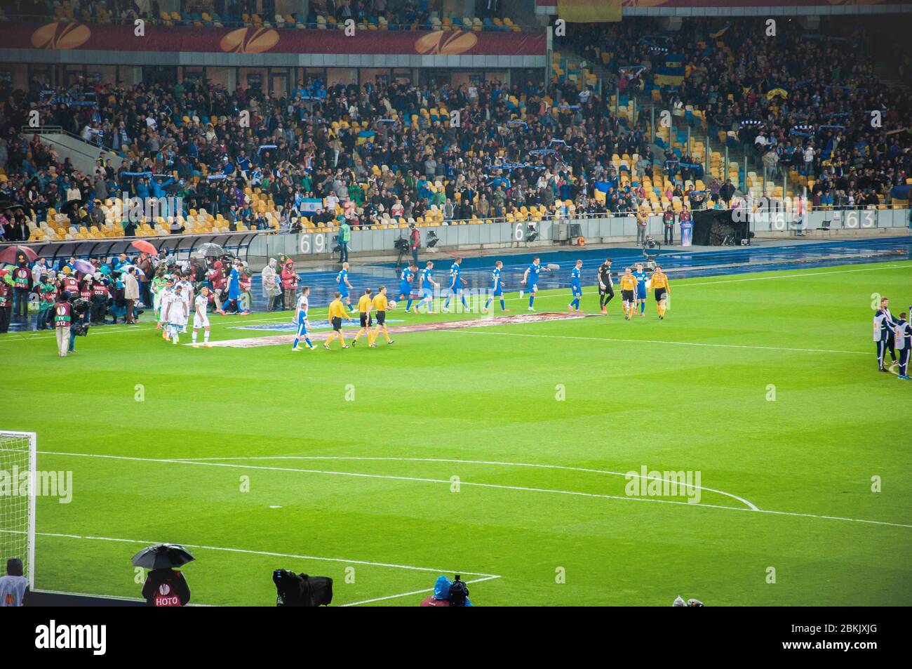 KYIV, UKRAINE - MAY 14, 2015 FC Dnipro and FC Napoli players entering the stadium for their UEFA Europa League semifinal game  Stock Photo