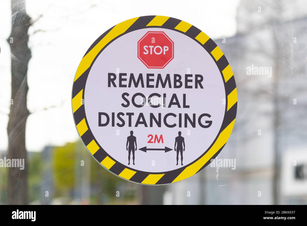 Glasgow, Scotland, UK. 4th May, 2020. Social Distancing two-metre rule - sign on bus shelter at Braehead shopping centre, Glasgow reminding passengers about the 2m social distancing rule, which has been adopted by the UK. Credit: Kay Roxby/Alamy Live News Stock Photo