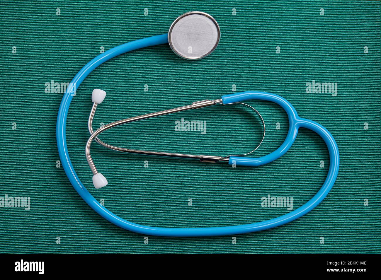 Stethoscope is an acoustic medical device for listening to internal sounds of body. Medical tool can be used to listen to sound made by the heart, lun Stock Photo