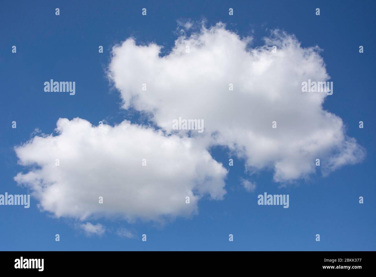 White cumulus clouds against blue sky, Stanwell Moor, Surrey, England, United Kingdom Stock Photo