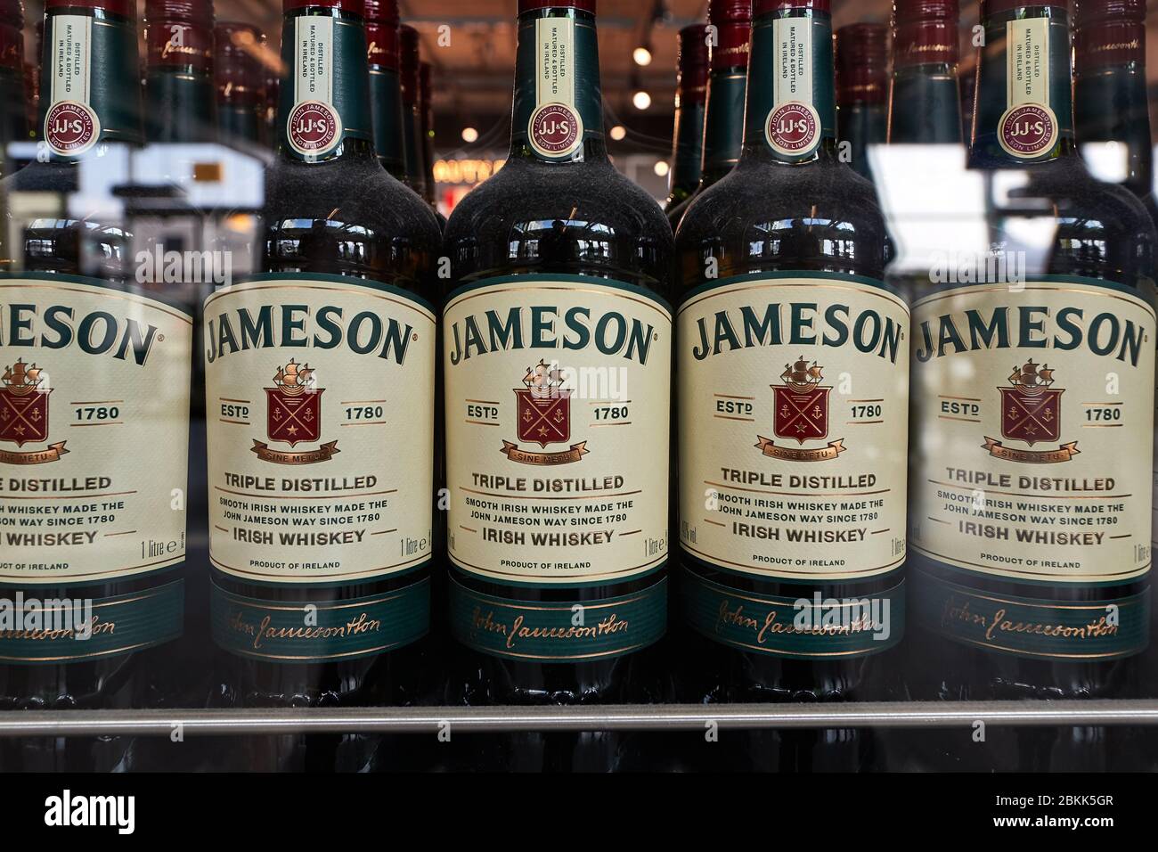 Bottles of Jameson whisky in a shop window Stock Photo