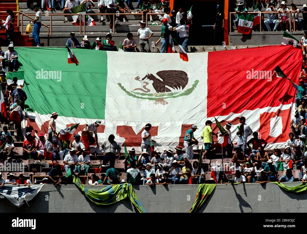 Giant flag in a Mexican stadium Stock Photo