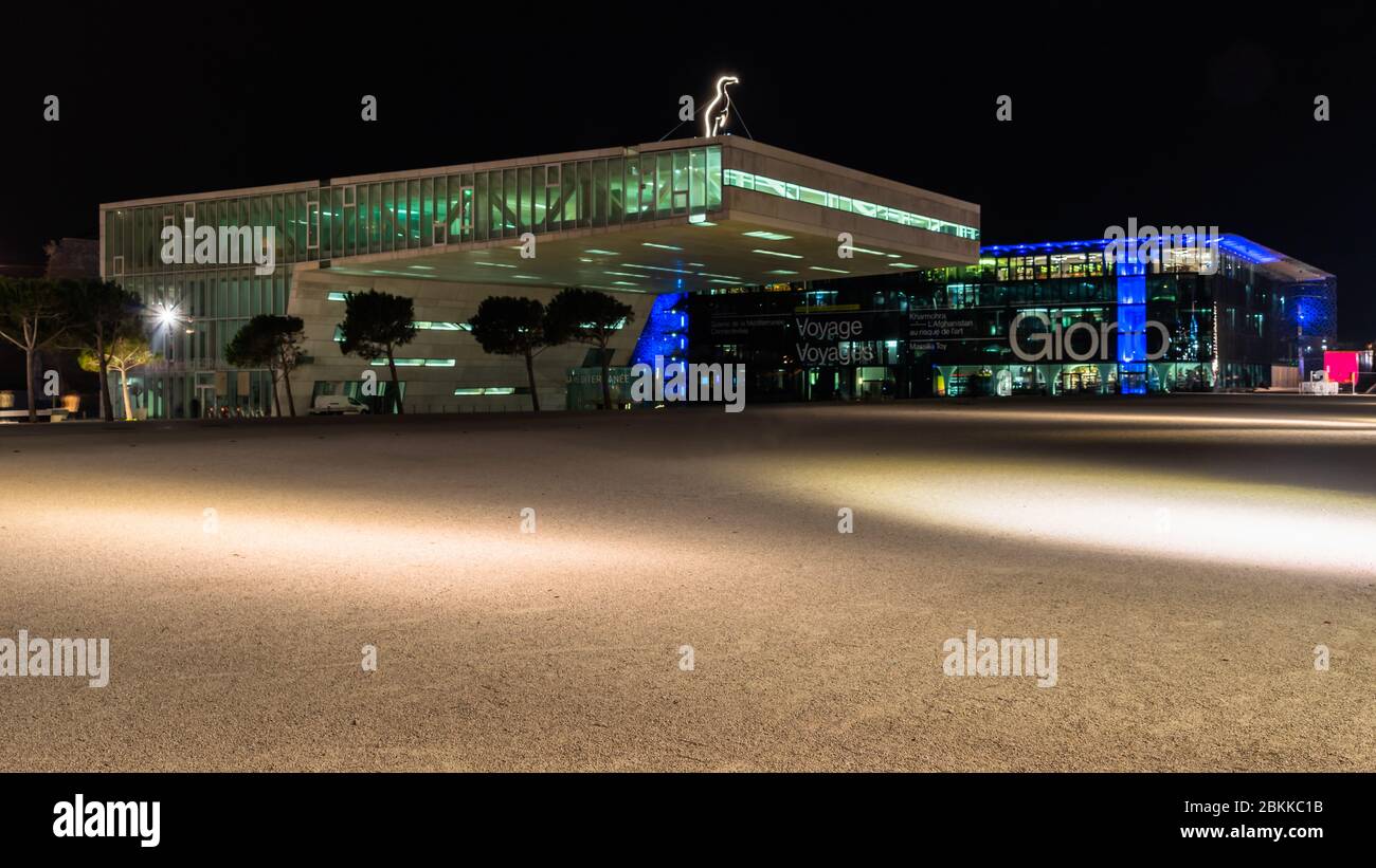 Night view of the Villa Mediterranee designed by the architect Stefano Boeri and MuCEM museum in the background. Marseille, France, January 1, 2020 Stock Photo
