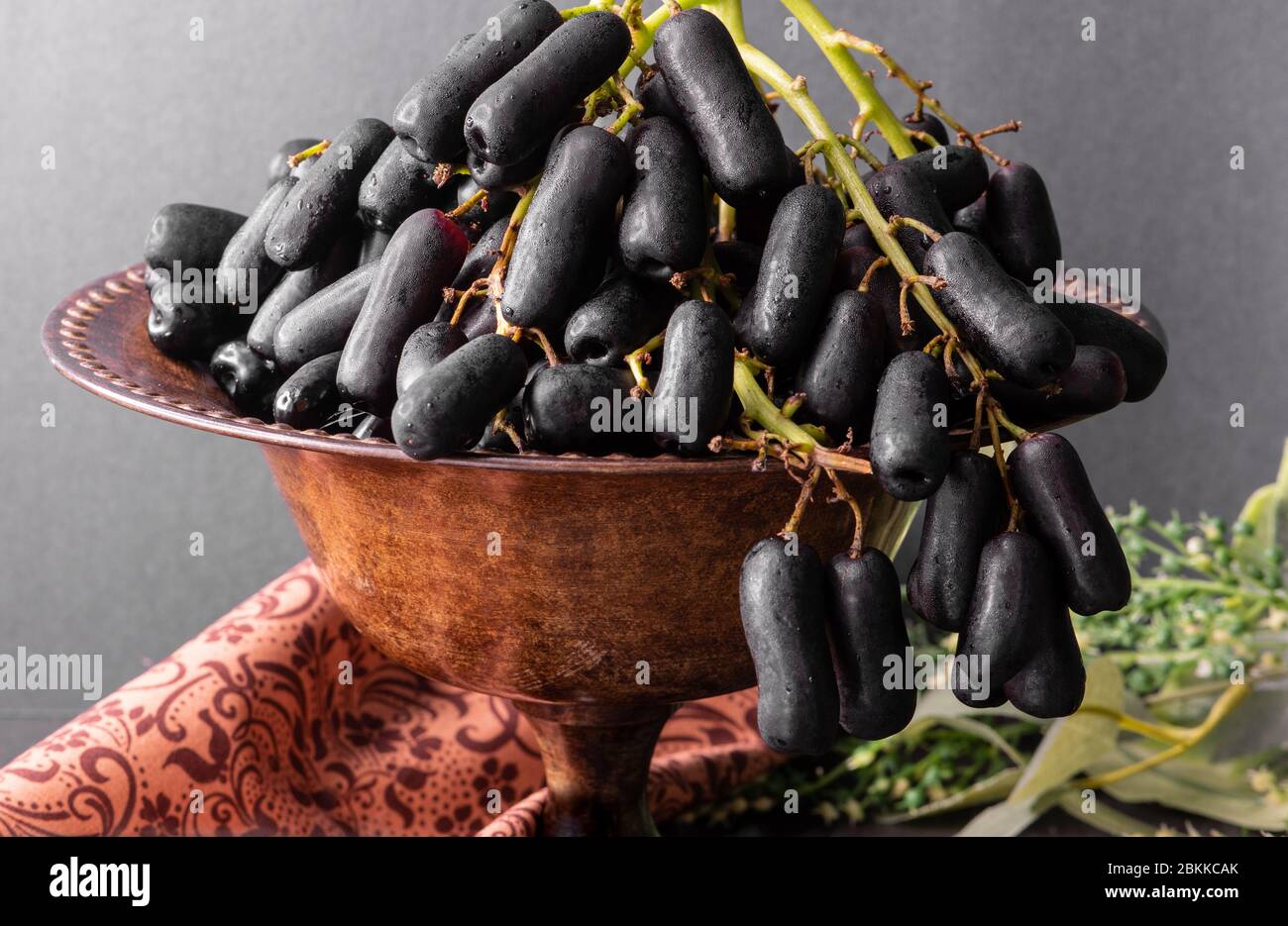 Sweet Saphire Grapes grown in California are a new exciting variety that is crisp and has an unual long shape like a finger. Stock Photo