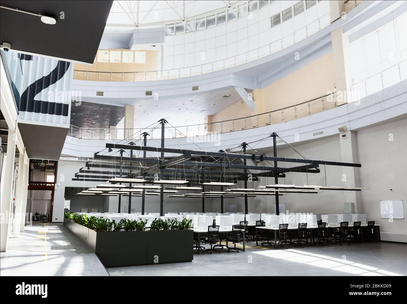 Side view on open office for workers with computers Stock Photo