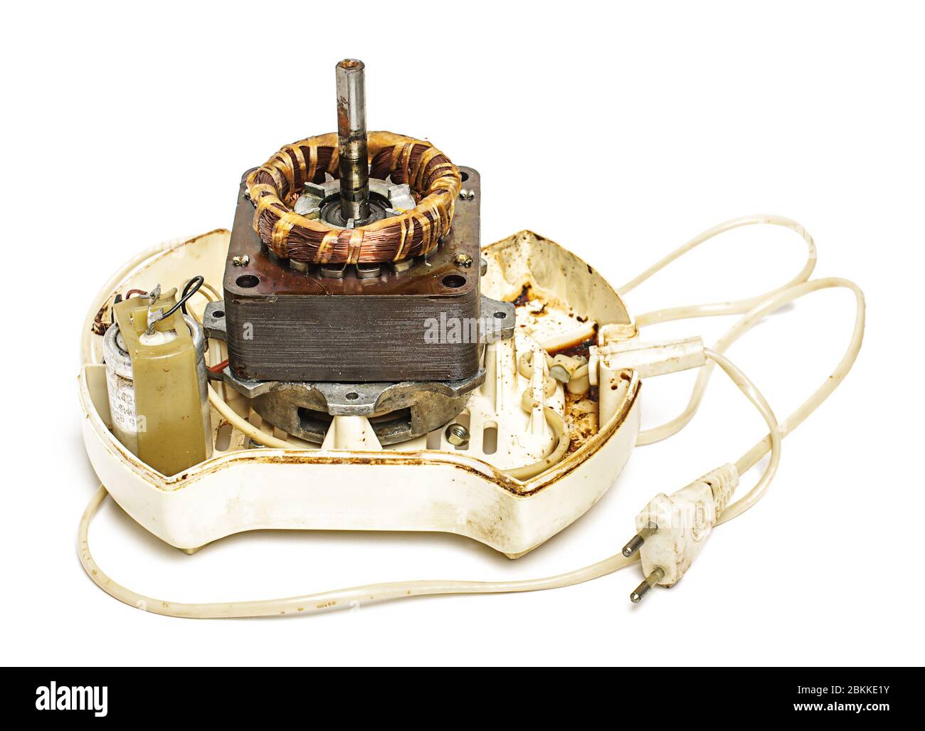 Old juicer motor repair process. Internal parts of juicer motor Stock Photo