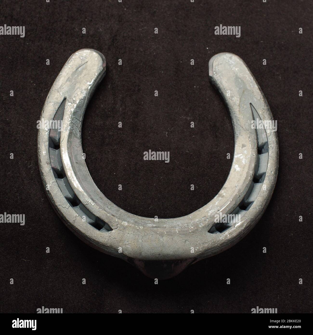 Real metal horse shoe isolated on the black background Stock Photo Alamy